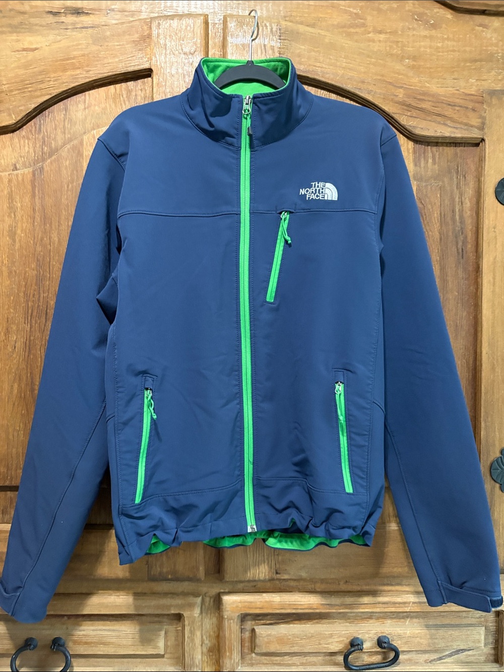 The North Face Men’s Navy Jacket with Green Zippers